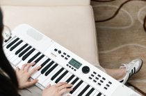 61-Key Portable Keyboard with 700 Tones, White